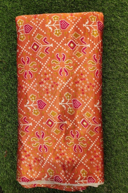 Gaji Silk Orange Fabric With Gaji Table Print